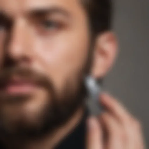 Bearded man trimming his facial hair with scissors