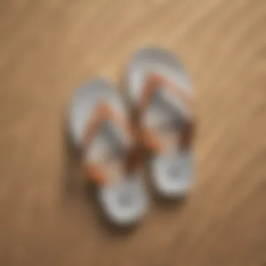 Stylish and supportive walking flip flops on a sandy beach