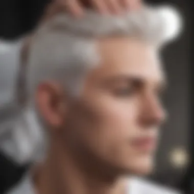 Hand applying white hair dye with precision