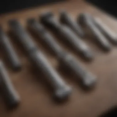 Various types of hair clippers arranged on a table.