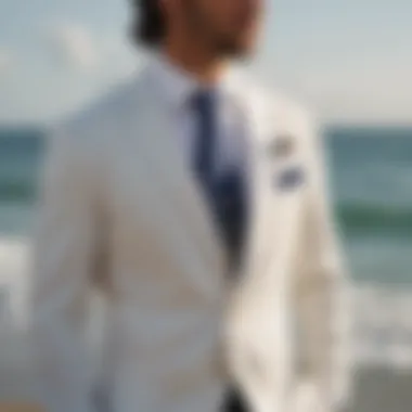 Stylish beach wedding groom's attire with a touch of nautical charm