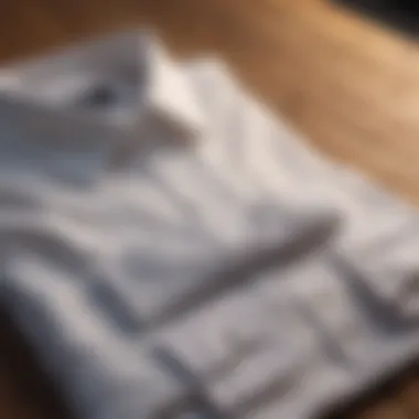 Elegant white linen shirt laid out on a wooden table