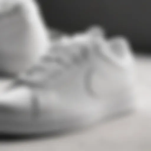 Stylish close-up of Nike white flat sneakers showcasing design details