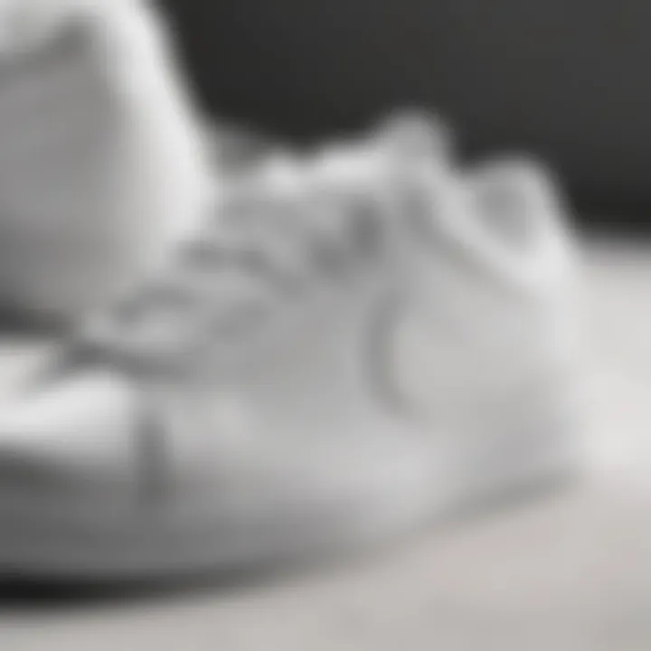 Stylish close-up of Nike white flat sneakers showcasing design details