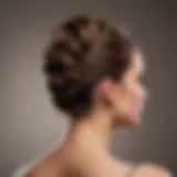 Woman showcasing a chic thin natural hair updo