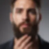 Bearded man applying Goodfellow beard oil