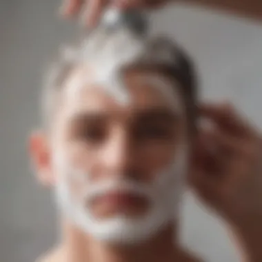 A close-up of shaving cream being applied to the scalp.