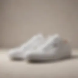 Stylish Kenneth Cole white sneakers on a minimalist background