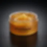 Golden honey wax in a luxurious container