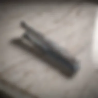 Precision Razor for Smooth Shaving A close-up view of a razor blade on a marble countertop