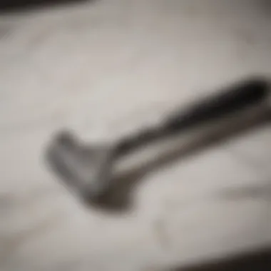 Precision Shaving Razor Close-up of a shaving razor on a marble countertop