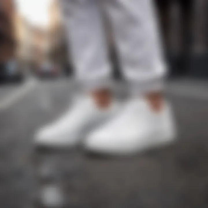 Stylish white trainer shoes showcased in urban setting